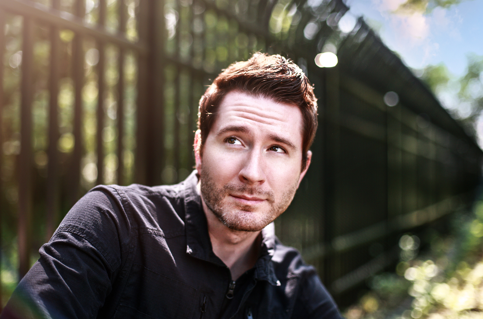 Promotional photograph of Owl City.