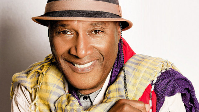Promotional photograph of Paul Mooney.