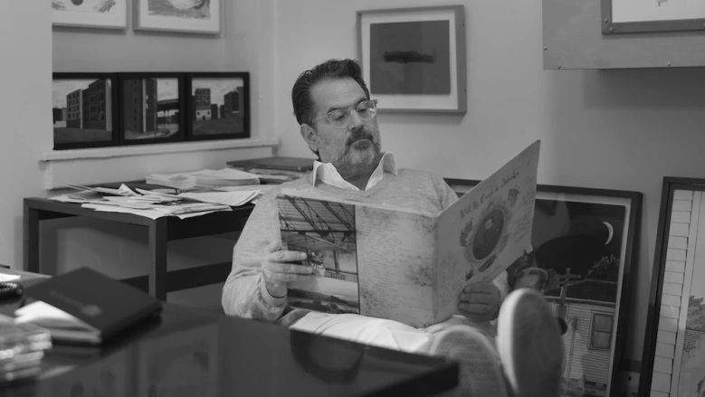 Promotional photograph of Randall Poster.