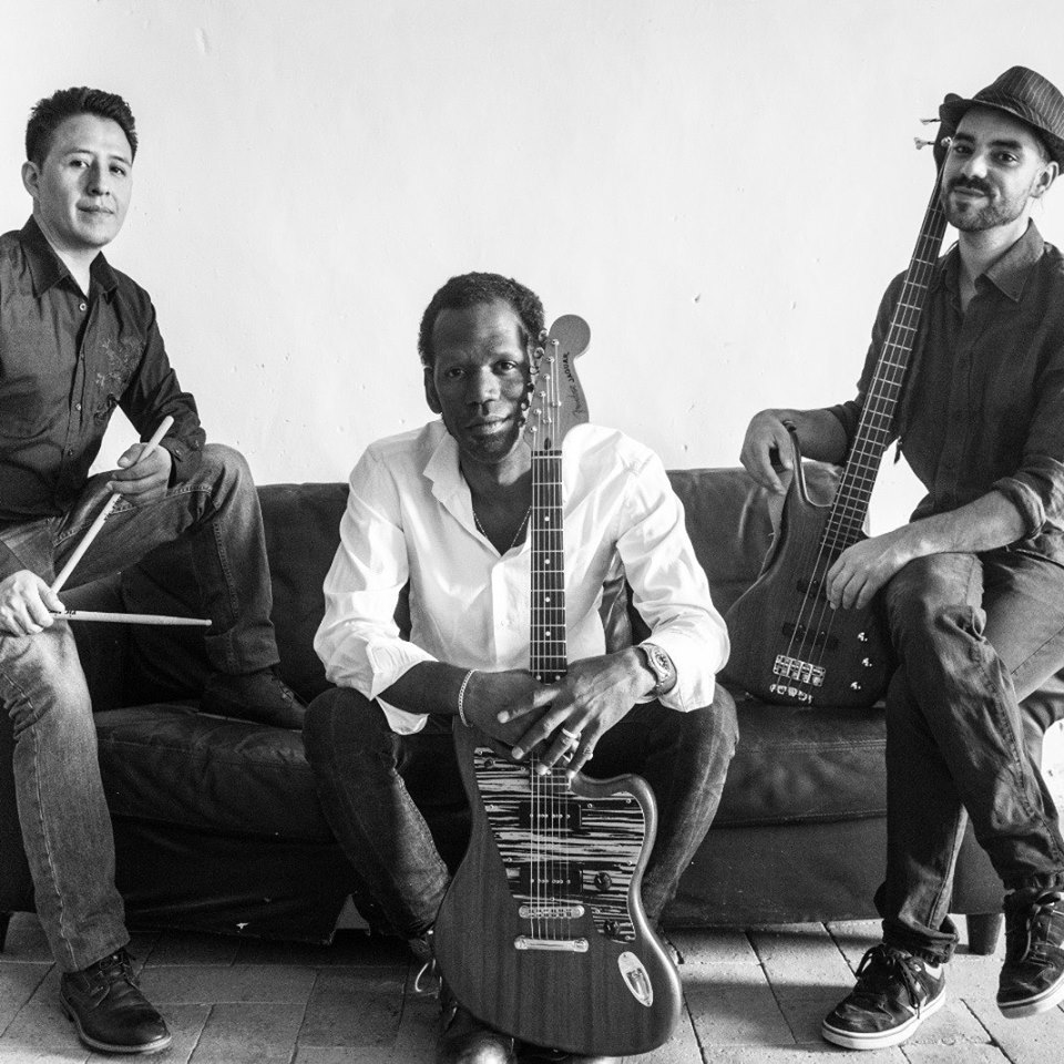 Fotografia promocional de Rodney Homar Trio.