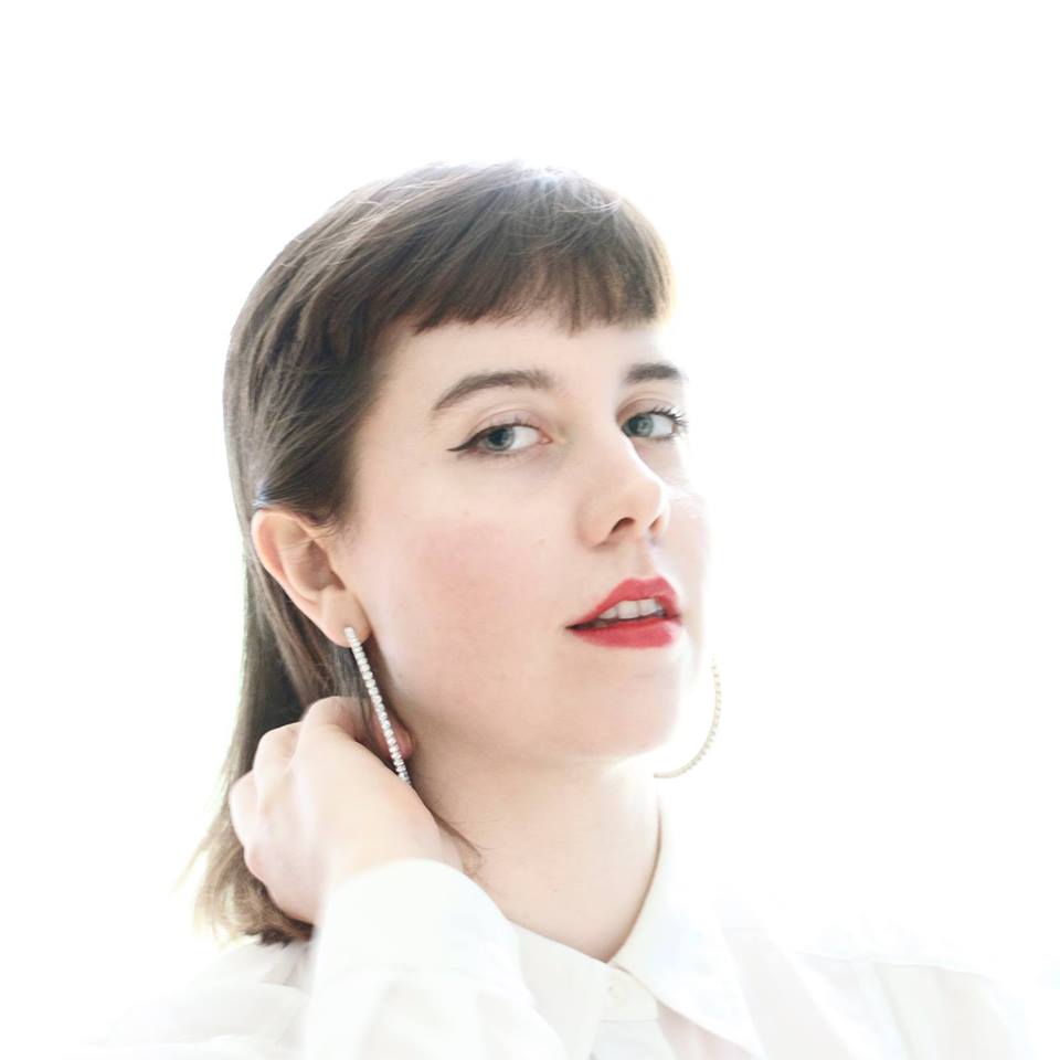 Promotional photograph of Rose Betts.