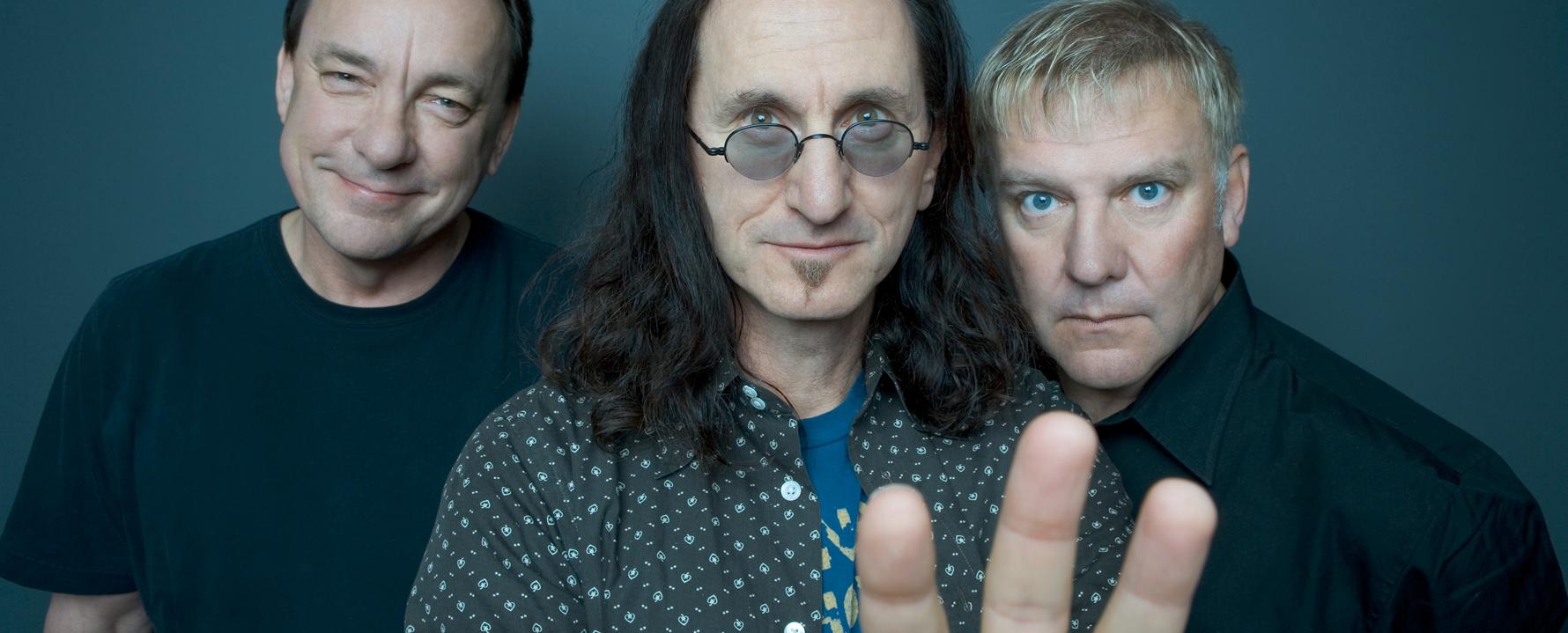 Promotional photograph of Rush.
