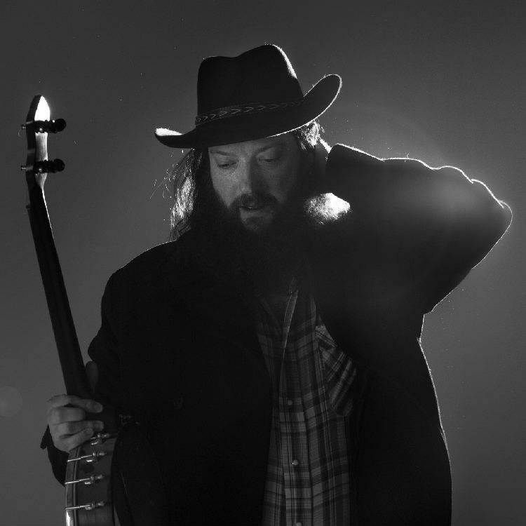 Promotional photograph of Concierto de Sean Canan's Voodoo Players en St Louis.