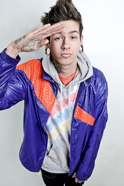 Promotional photograph of T. Mills.