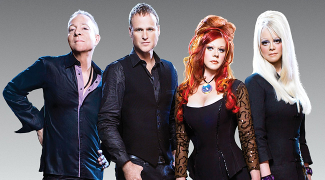 Promotional photograph of The B-52's.