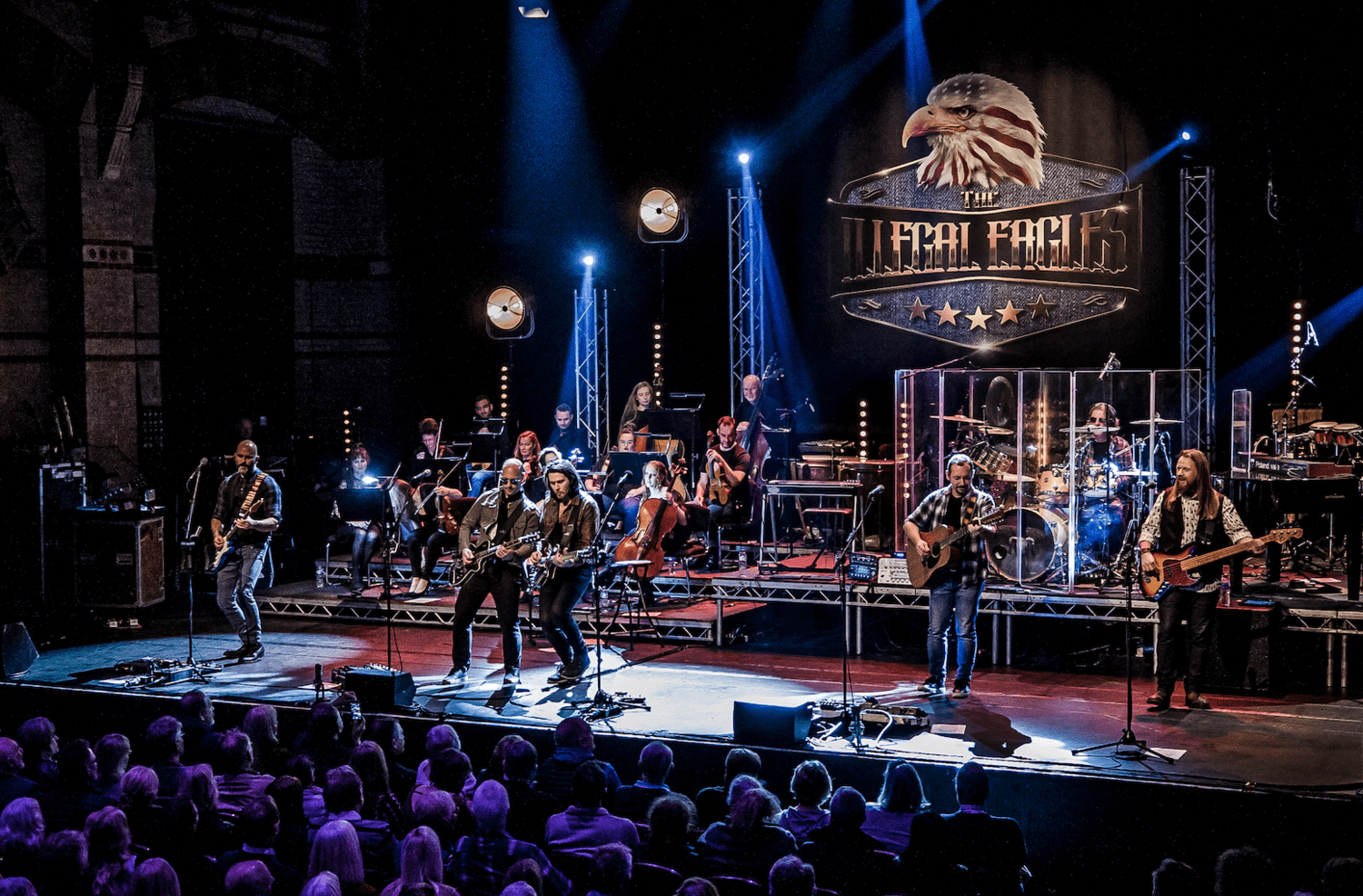 Promotional photograph of The Illegal Eagles.