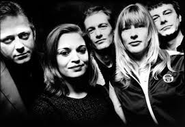 Promotional photograph of The Mekons.