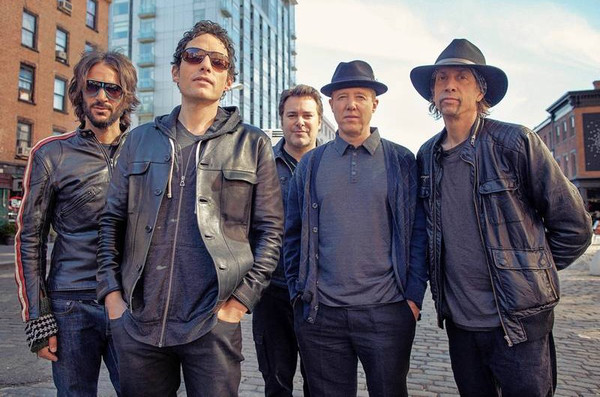 Promotional photograph of The Wallflowers.