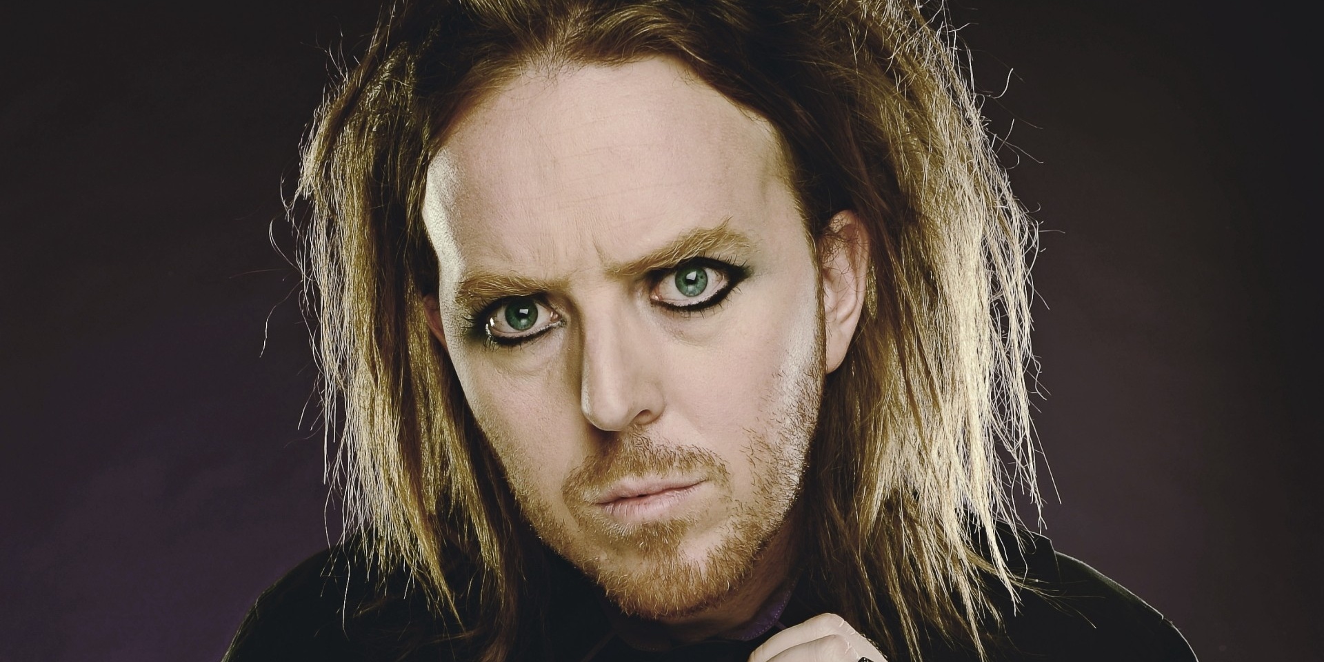 Promotional photograph of Tim Minchin.