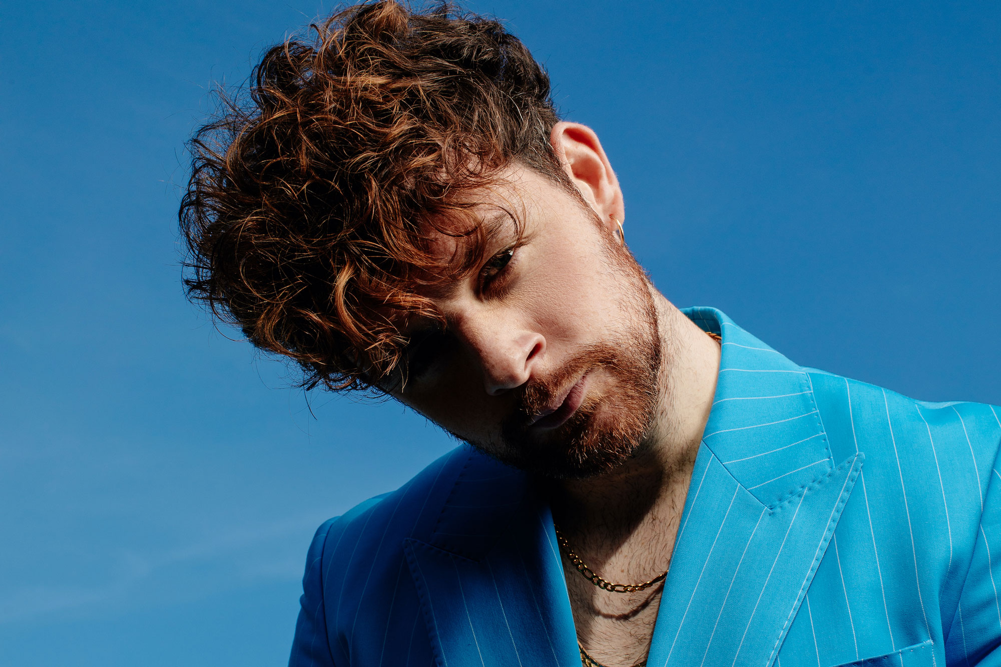 Promotional photograph of Tom Grennan.