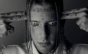 Promotional photograph of Tom MacDonald.