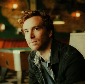 Fotografia promocional de Tom Mackell.