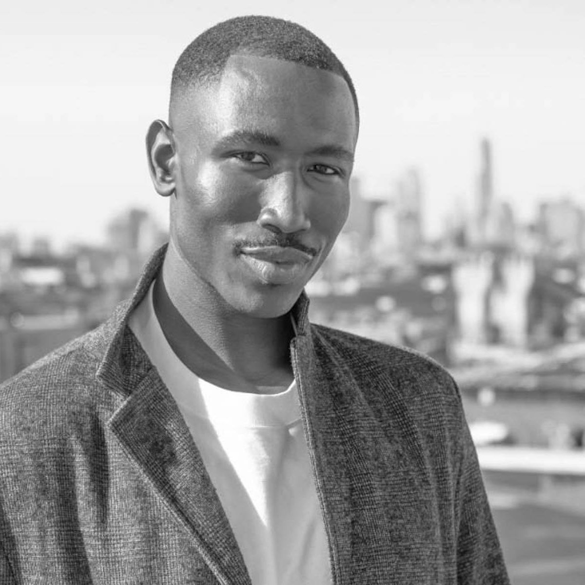 Promotional photograph of Travis Percy.