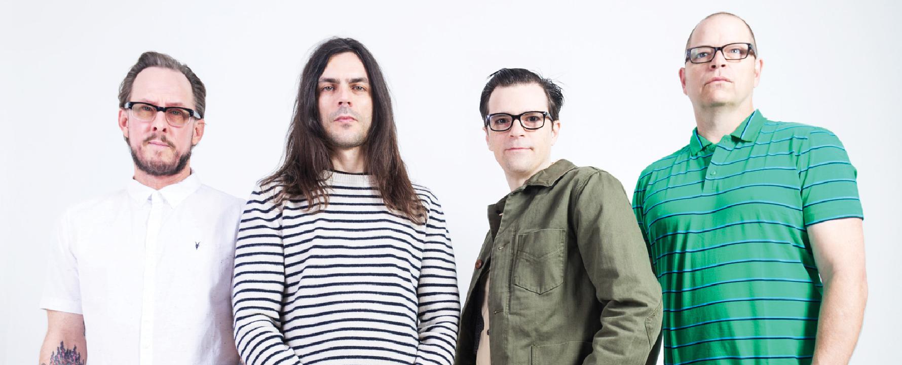 Promotional photograph of Weezer.