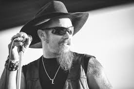 Promotional photograph of Concierto de Whey Jennings en Benton.